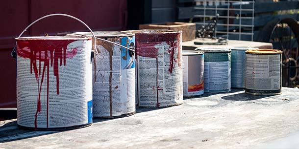 Used paint tins, fuels and solvents.