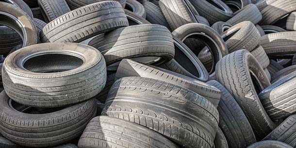 pile of used tyres for disposal